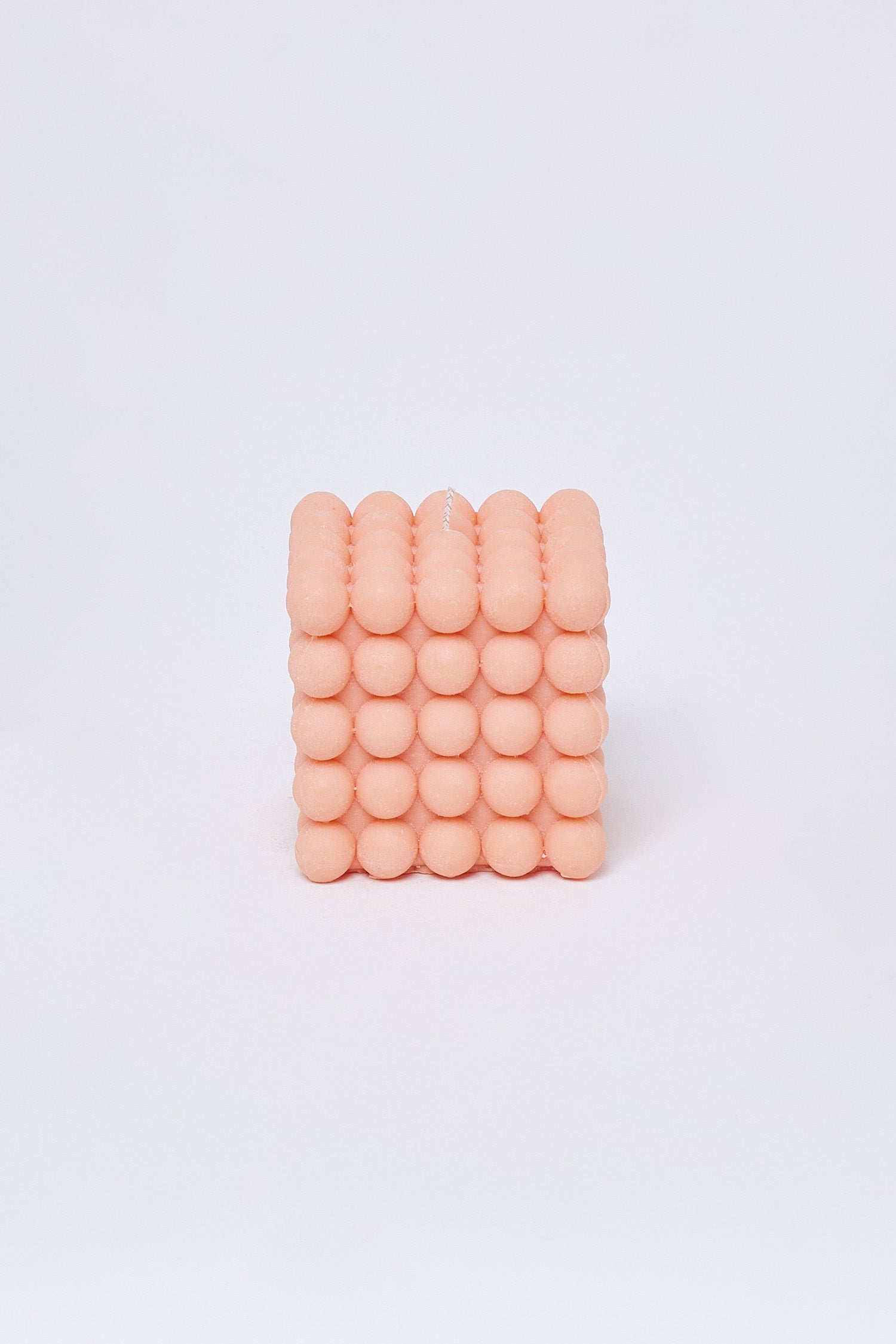 La vela de espuma de melocotón grande