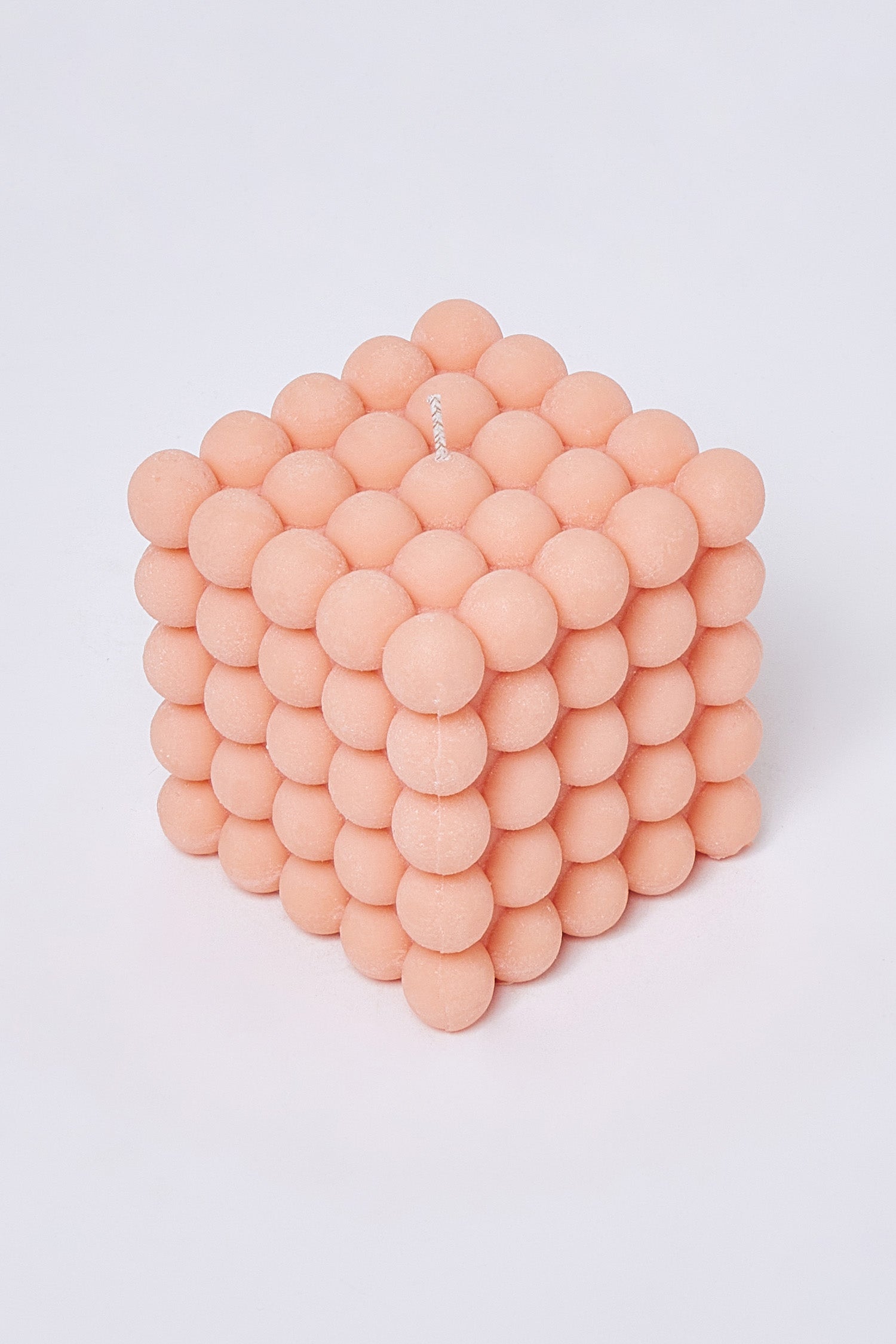 La vela de espuma de melocotón grande